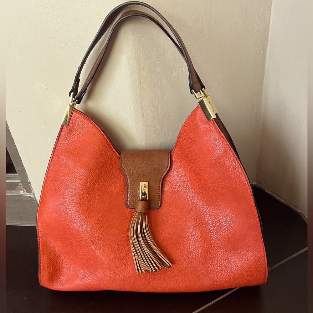 Orange and brown leaderhandbag